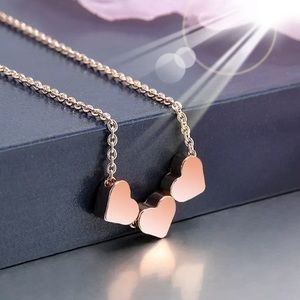 Triple heart rose gold necklace